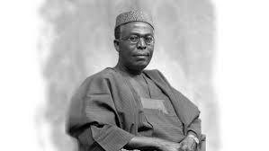 Obafemi Awolowo: Life, Legacy, and the Enduring Impact of Nigeri Portrait of Chief Obafemi Awolowo in traditional Yoruba attire, seated and looking directly at the camera.