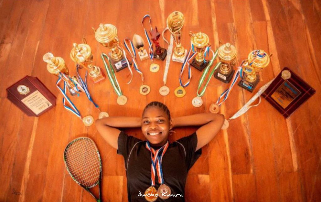 Rofiat Abdulazeez proudly displays her medals and laurels after dominating the squash events at the 2024 National Sports Festival in Abeokuta.