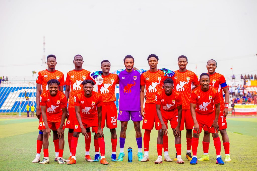 Wikki Tourists FC players line up before their decisive NNL match against Zamfara United
