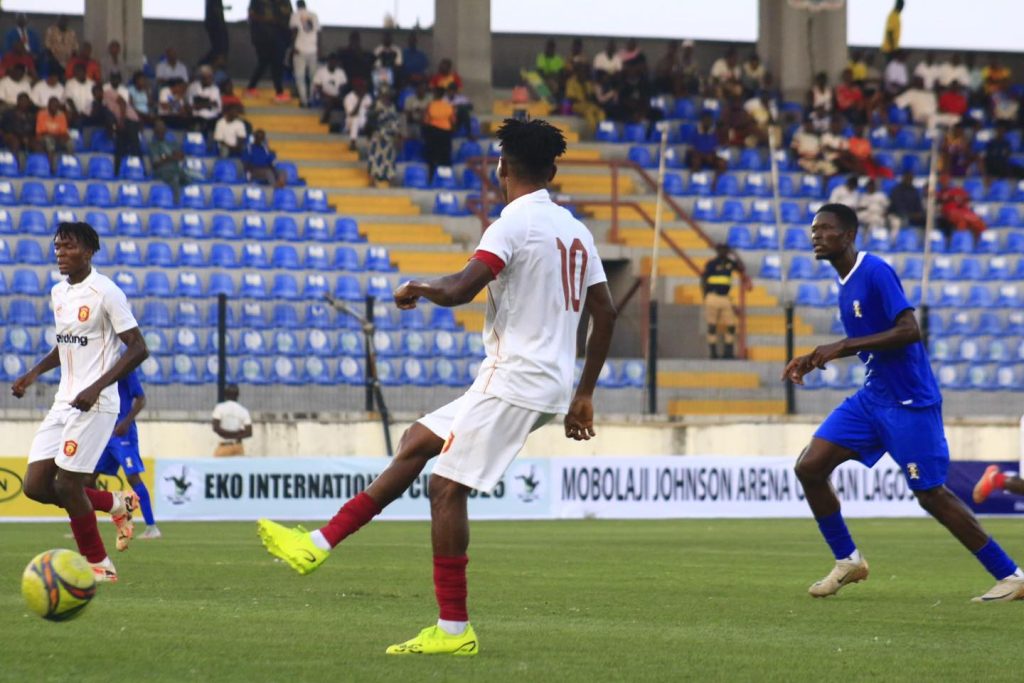 Ikorodu City players challenge Shooting Stars attackers during a tense match in the Eko International Preseason Tournament at Mobolaji Johnson Arena
