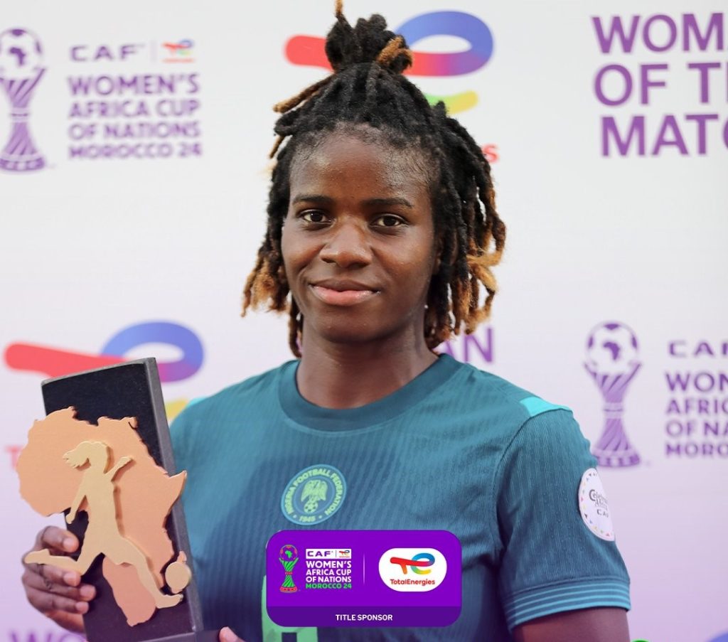 Esther Okoronkwo holding MVP award after Nigeria's WAFCON 2025 victory over Tunisia