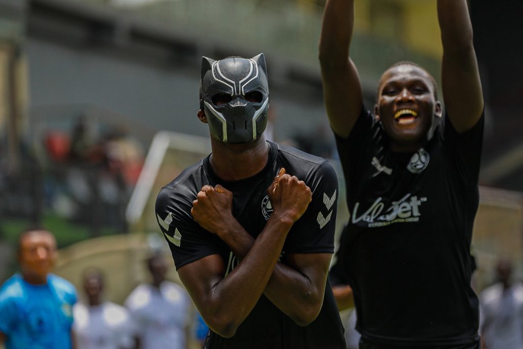 Akinocho Merveille of Beyond Limits FA celebrates his decisive goal in the TCC Super Cup final with a mask covering his face at Mobolaji Johnson Arena, Lagos.