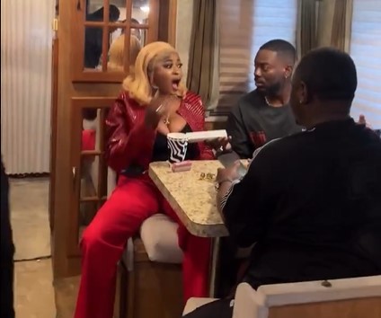 Adekunle Gold Surprises BBNaija Season 10 Winner Imisi With Brand New iPhone 17 Pro Max Adekunle Gold presenting an iPhone 17 to Imisi